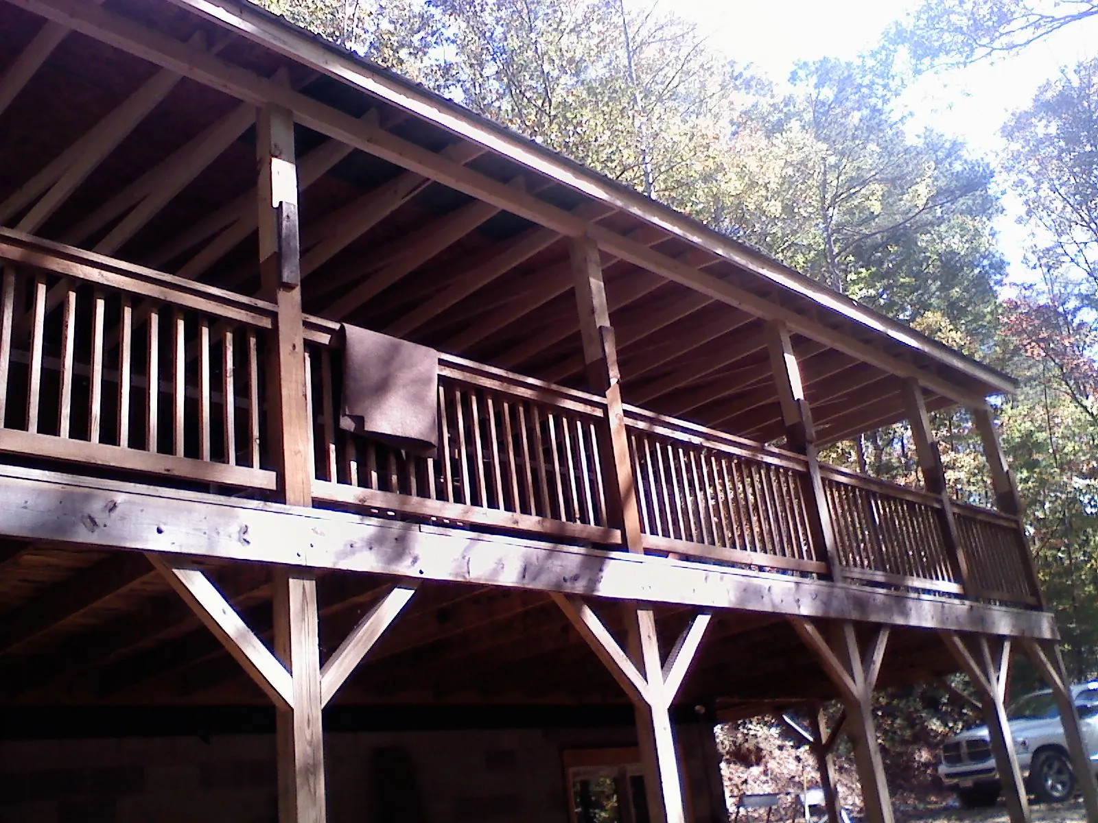Timber framing under a new elevated porch and deck — Roof Leak Repair in Colgate by Roofing Brothers